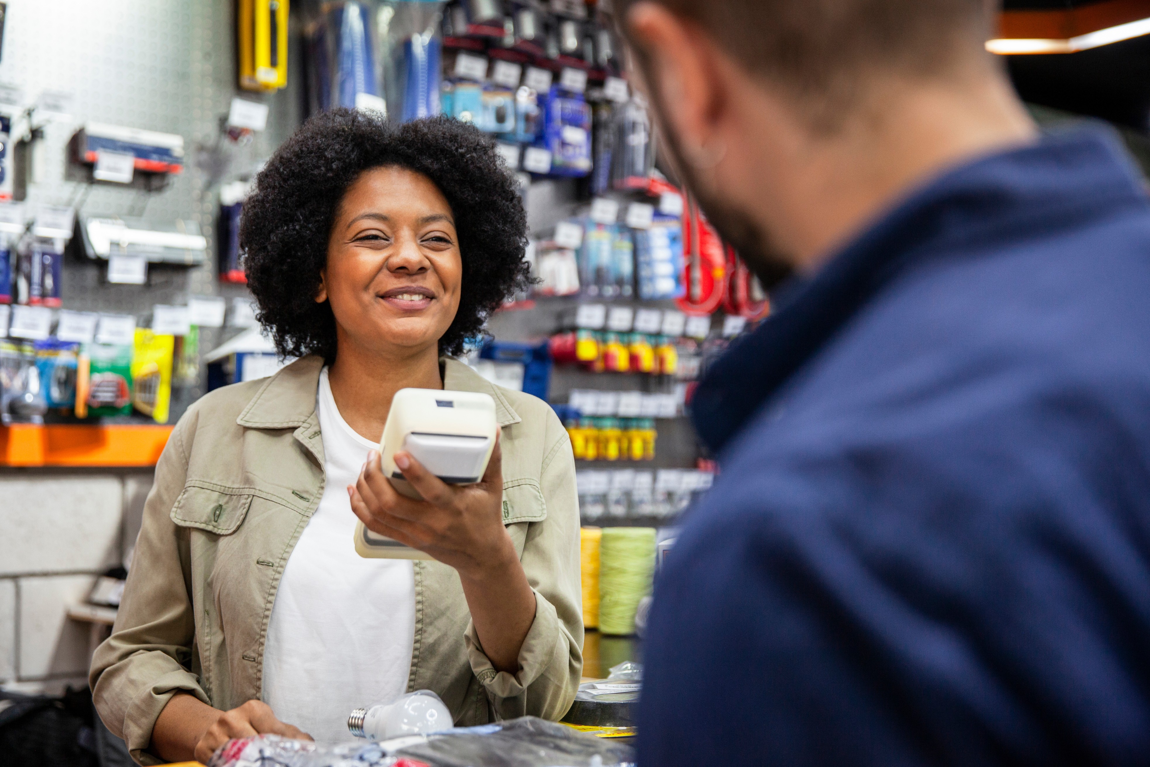 DIY Store worker serving a customer 